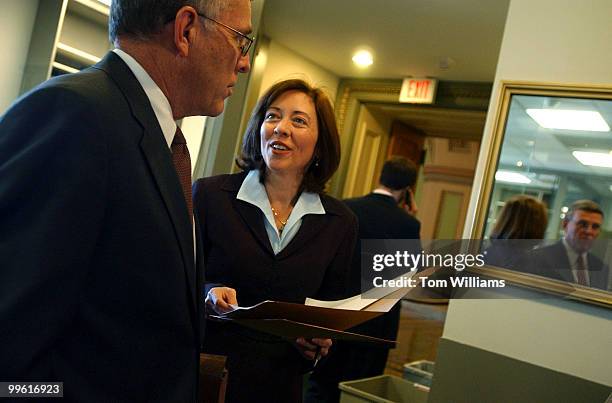 Sen. Maria Cantwell, D-Wash., talks with Sen. Byron Dorgan, D-N.D., before a news conference calling for a special investigation of allegations that...