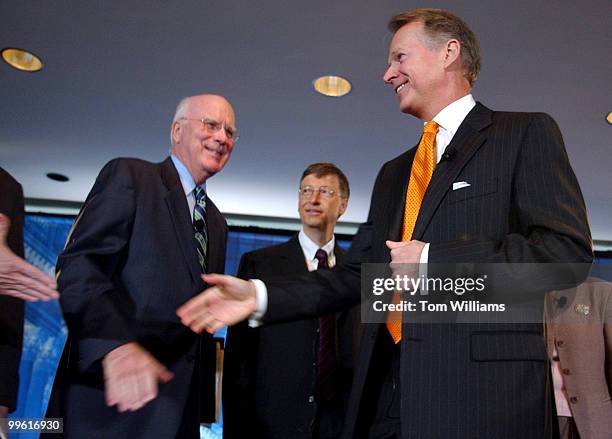 Rep. David Dreier, R-Calif., arrives at a panel discussion with Sen. Pat Leahy, D-Vt., left, and Microsoft chairman, Bill Gates, among others, to...