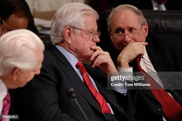 Ranking member Carl Levin, D-Mich., right, has a word with Sen. Ted Kennedy, D-Mass., as Sen. Robert Byrd, D-W.V., looks on during a Senate Armed...