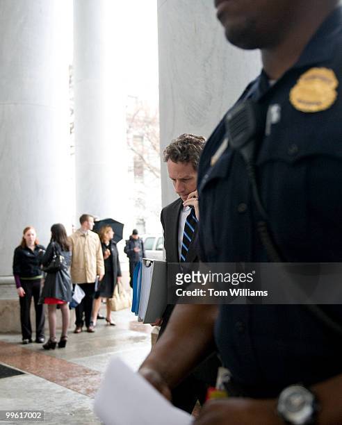 Secretary of the Treasury Tim Geithner enters the Rayburn Building to testify before a House Financial Services Committee hearing entitled...