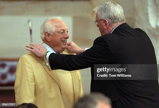 Tommy Lasorda talks to Senator and former major league baseball player, Jim Bunning, R-Ky., before the Congressional Gold Medal ceremony in the...