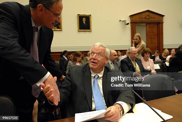 Rep. Dennis Hastert, R-Ill., greets Charles Shapiro, deputy assistant secretary, Bureau of Western Hemisphere Affairs, State Department, before a...