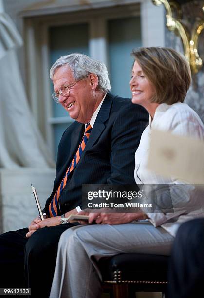 Speaker of the House Nancy Pelosi, D-Calif., former Speaker Dennis Hastert share a laugh during the unveiling of Hastert's official portrait during a...