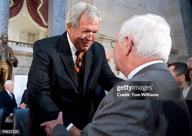 Former Speaker of the House Dennis Hastert greets members of Congress after the unveiling of his official portrait at a ceremony in Statuary Hall,...