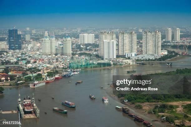 aerial view of saigon river with the city center, ho chi minh city, vietnam - saigon river stock pictures, royalty-free photos & images