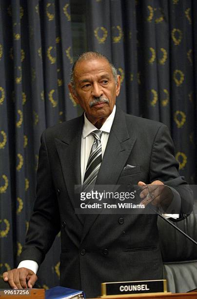 Chairman of the House Judiciary Committee John Conyers, D-Mich., arrives at a hearing featuring testimony by Attorney General Alberto Gonzales on the...