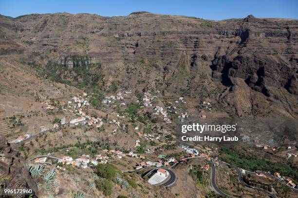 view from mirador cesar manrique onto terraced fields and houses of lomo del balo and la vizcaina, valle gran rey, la gomera, canary islands, spain - mirador stock pictures, royalty-free photos & images