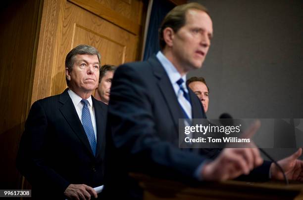 Rep. Dave Camp, R-Mich., answers a question during a news conference on the House GOP plan for health care reform as Rep. Roy Blunt, R-Mo., left,...