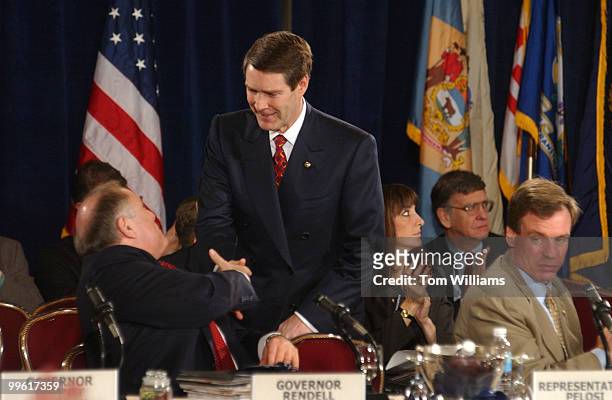 Senate Majority Leader Bill Frist, R-Tenn., greets Gov. Ed Rendell, D-Pa., as Gov. Mark Warner, D-Va., as looks on he gave a speech at the National...