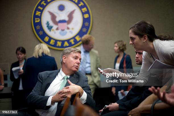 Sen. Lindsey Graham, R-S.C., talks to a reporter before a news conference with Sen. Mel Martinez, R-Fla., on their support of nomination of Sonia...
