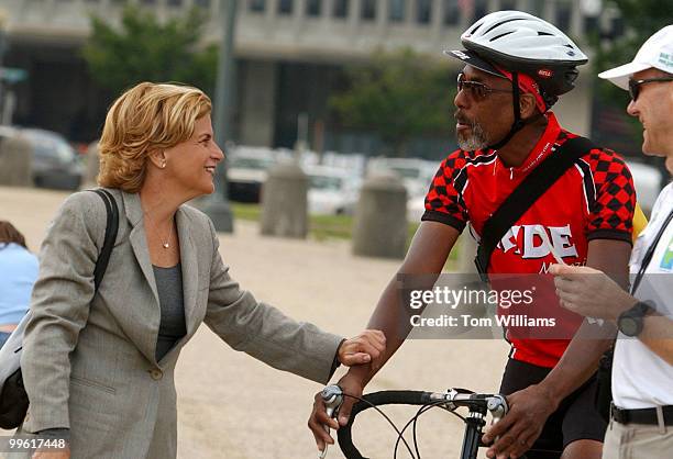 Rep. Ileana Ros-Lehtinen, R-Fla., talks to Kevin Porter from Key West Fla., during a news conference near the Capitol Reflecting pool, to inaugurate...