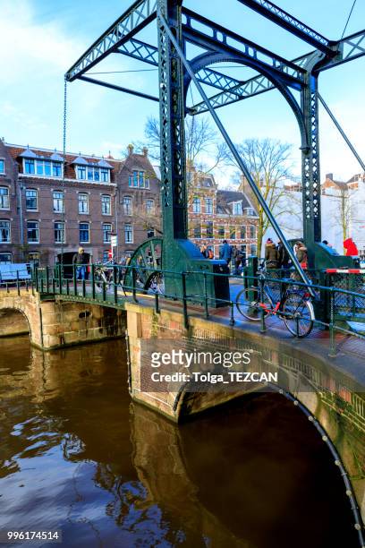 draw bridge, amsterdam - bascule bridge stock pictures, royalty-free photos & images