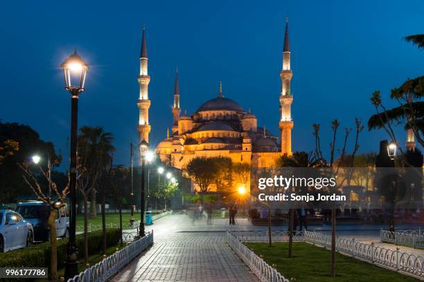 illuminated sultan ahmed mosque, unesco world heritage sitean side, istanbul, turkey - sultan mosque stock pictures, royalty-free photos & images