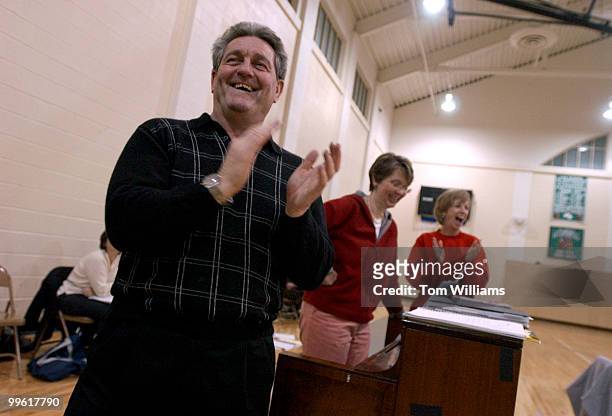 Malcolm Edwards, director of Hexagon, Sue Mason McElroy, piano player, and Kay Casstevens, one of four choreographers, share a laugh during a...