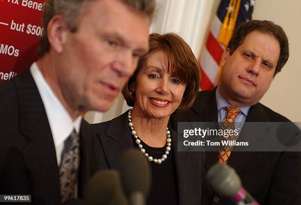 Sen. Tom Daschle, D-S.D., House Minority Leader Nancy Pelosi, D-Calif., and Rich Fiesta, Alliance for Retired Americans, attend a news conference to...