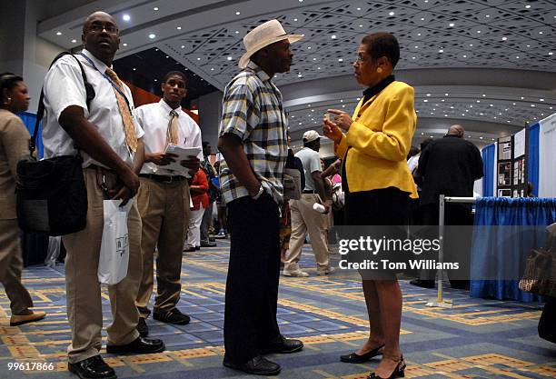 Del. Eleanor Holmes Norton, D-D.C., talks with Donald Brooks at 9th Annual Norton Job Fair, which she sponsors. The event was held at the Convention...