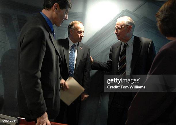 Rep. Steve King, R-Iowa, center, talks with Lee Hamilton, director of the Woodrow Wilson Center as Prof. Daniel Tichenor, Rutgers, looks on, before a...