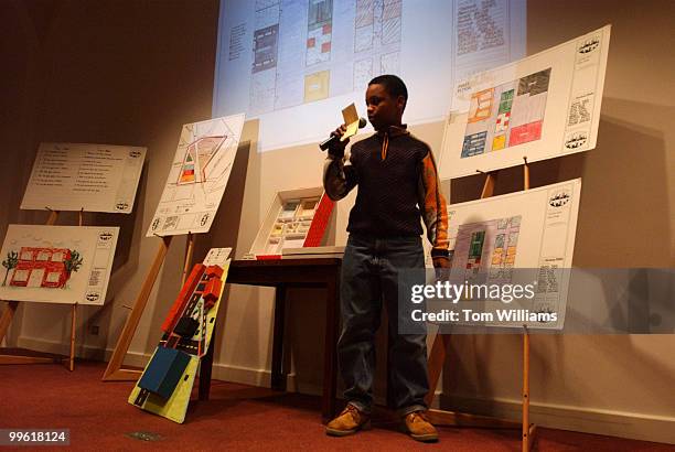 George Ross II, a 7th grader from the Brightood/Takoma Sector, gives a presentation of possible design plans to refurbish H Street, NE., at the...