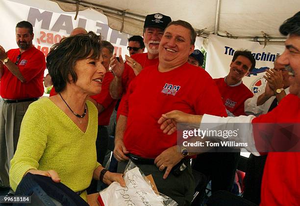 Sen. Barbara Boxer, D-Calif., greets Richard Trumka, right, AFL-CIO Secretary Treasurer, after she spoke at a rally of the International Association...