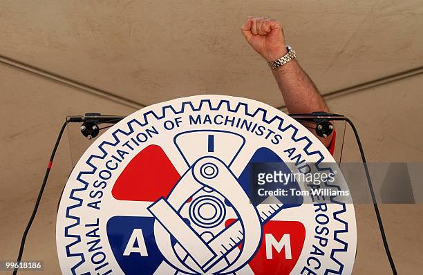 Thomas Buffenbarger, IAM president, pumps his fist while addressing a rally of the International Association of Machinists and Aerospace Workers , in...