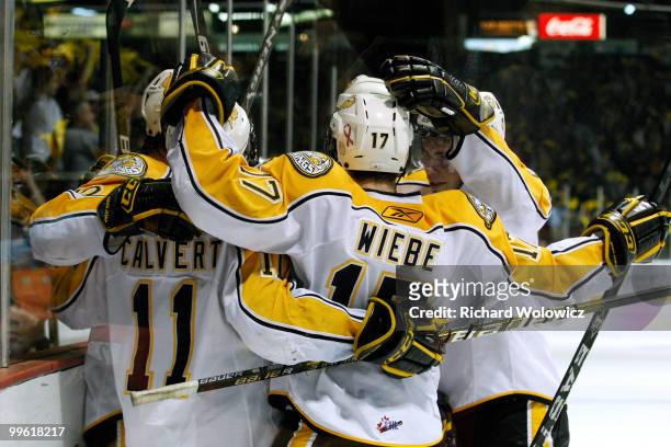 Members of the Brandon Wheat Kings celebrate the second period goal by Brayden Schenn during the 2010 Mastercard Memorial Cup Tournament game against...