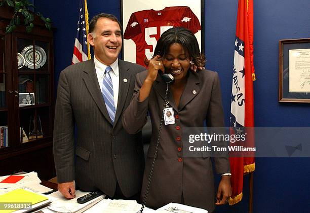 Intern for Rep. John Boozman, R-Ark., left, Princella Smith, gets a call from MTV informing her she is among the top finalists for the "Stand Up and...