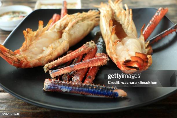 sauce and shrimp baking - spider crab stock pictures, royalty-free photos & images