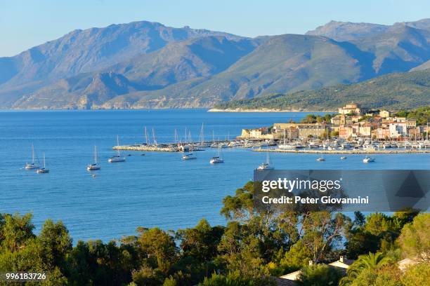 the bay of saint-florent, cap corse in the back, saint florent, haute-corse, corsica, france - cap corse stock-fotos und bilder