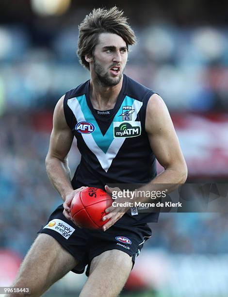 Justin Westhoff of the Power runs with the ball during the round eight AFL match between the Port Adelaide Power and the Carlton Blues at AAMI...
