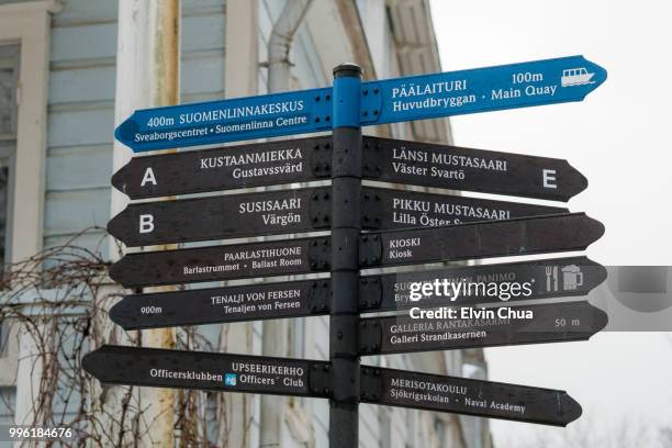 street sign on suomenlinna - suomenlinna stock pictures, royalty-free photos & images