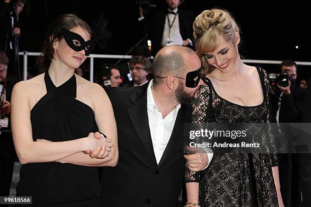 Actress Pauline Etienne with director Gilles Marchand and actress Louise Bourgoin attends "Black Heaven" Premiere at the Palais des Festivals during...