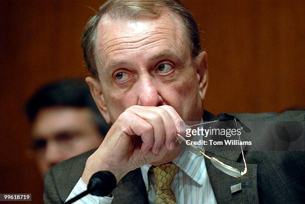 Sen. Arlen Specter, R-Pa., chairman of the Senate Judiciary Committee listens to the testimony of Robert Mueller, director of the Federal Bureau of...