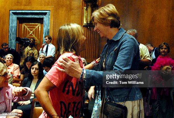 Anti war activist Cindy Sheehan, right, greets Medea Benjamin of Coder Pink during a Senate Judiciary Committee hearing on proposals to limit...