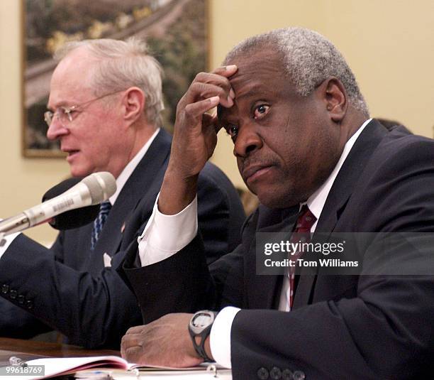 Supreme Court Justices Clarence Thomas, right, and Anthony Kennedy appear before a hearing of the House Appropriations Subcommittee, to discuss the...