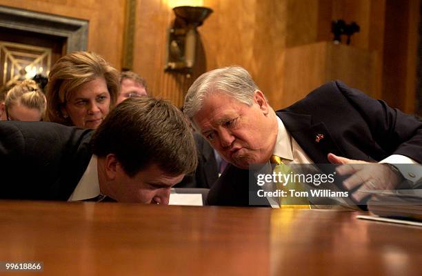 Gov. Haley Barbour, R-Miss., talks with chief counsel Paul Hearst, as Barbour's wife Marsha looks on, during a hearing entitled "Hurricane Katrina:...