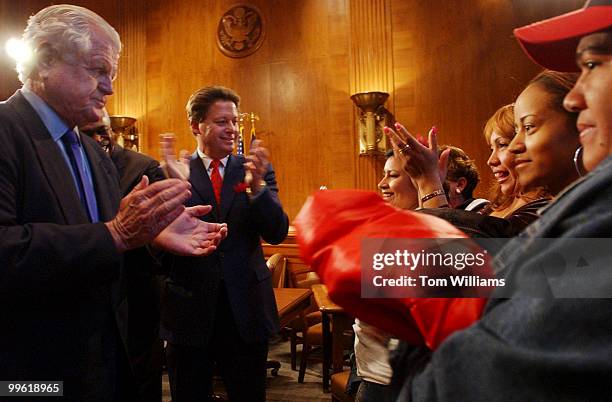 Sen. Ted Kennedy, D-Mass., and Charlie Wowkanech, Pres. Of the New Jersey AFL-CIO, applaud laundry workers that have been on strike for 9 weeks. All...