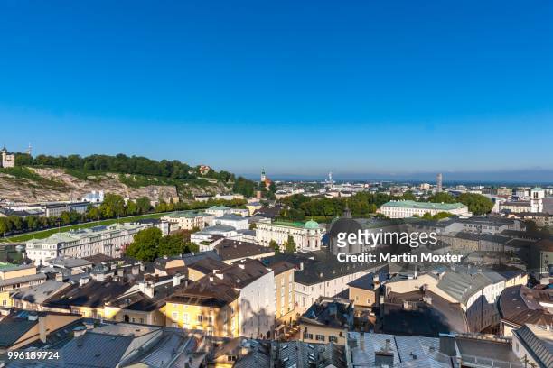 view from the kapuzinerberg on the neustadt with church of the holy trinity, hotel bristol and mirabell palace, salzburg, salzburg state, austria - palace hotel stock pictures, royalty-free photos & images