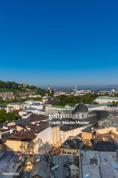 view from the kapuzinerberg on the neustadt with church of the holy trinity, hotel bristol and mirabell palace, salzburg, salzburg state, austria - palace hotel stock pictures, royalty-free photos & images