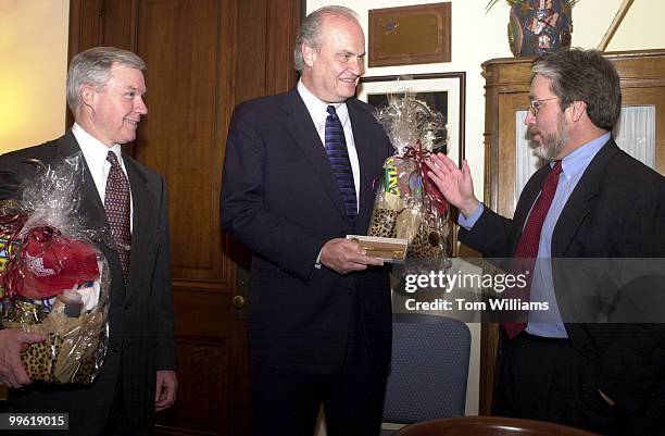 Ian Sanford, mayor of Sheffield, AL, presents gift baskets to Sens Fred Thompson, R-TN, and Jeff Sessions, R-AL. Thompson also received a key to the...