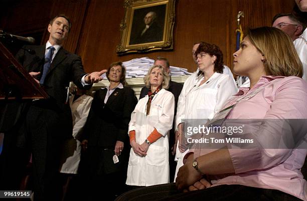 Senate Majority Leader Bill Frist, R-Tenn., addresses physicians across the country including OB-GYN Amanda Flicker, Wayne, Pa., 34 weeks pregnant,...