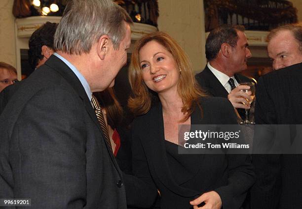 Journalist Andrea Koppel talks with Sen. Dick Durbin, D-Ill., before a dinner held by the U.S. Global Leadership Campaign to pay tribute to Durbin...