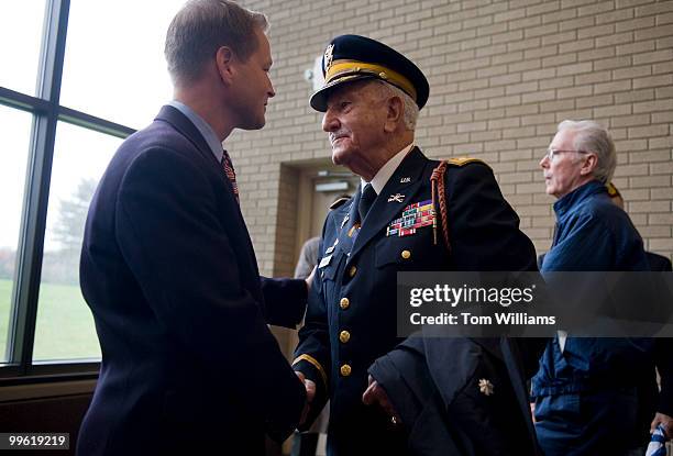 Rep. Frank Kratovil, D-Md., talks with Alfred H.M. Shehab Army Lt. Col. After a Veteran's Day ceremony in Maryland's Crownsville Veterans Cemetery,...