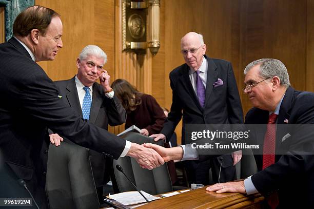 Secretary of Transportation Ray LaHood, right, greets ranking member of the Senate Banking Committee Richard Shelby, R-Ala., upon his arrival at the...