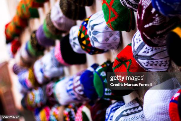 colourful muslim topis in essaouira - topi cap stock pictures, royalty-free photos & images