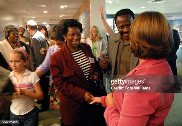 Ambassador of Zimbabwe Machivenyika Mapuranga, right, and his wife Shupikayi meet their host for the weekend at the visitors center in Lancaster,...