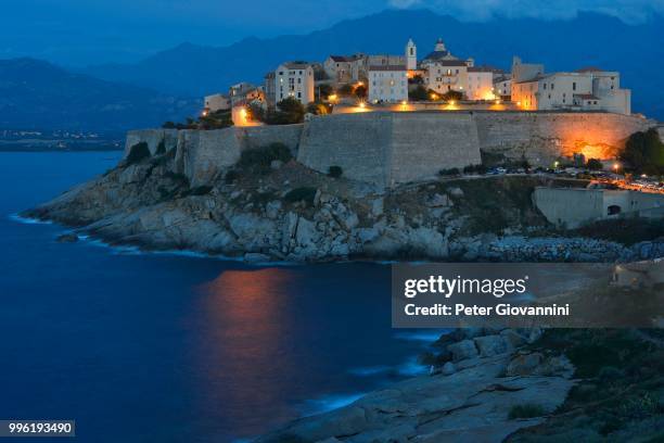 old town with citadel at dusk, calvi, haute-corse, corsica, france - calvi citadel photos et images de collection