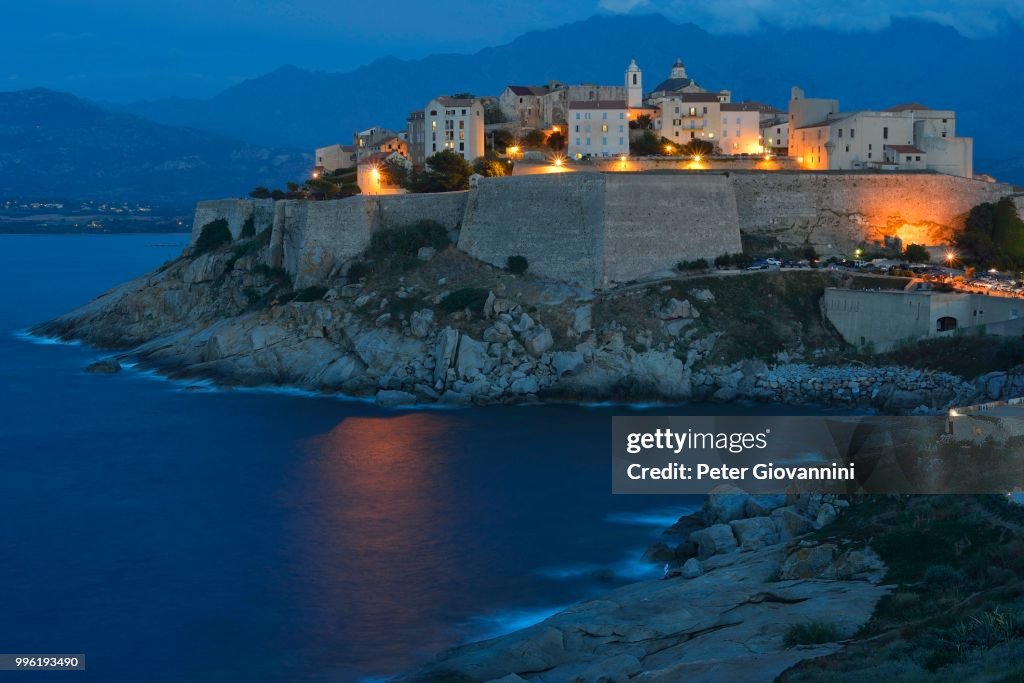 Old town with citadel at dusk, Calvi, Haute-Corse, Corsica, France