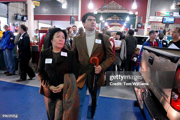 Ambassador of Kyrgyzstan Zamira Sydykova and her husband Giiaz Tokombaev walk through the Maheim Auto Auction, the largest auto auction in the world...