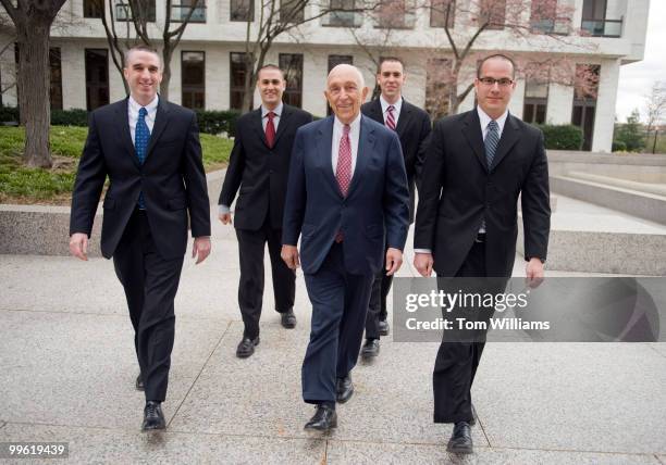 Staffers of Sen. Frank Lautenberg, D-N.J., center, show of their newly shorn heads that they shaved in support of their boss who is going through...