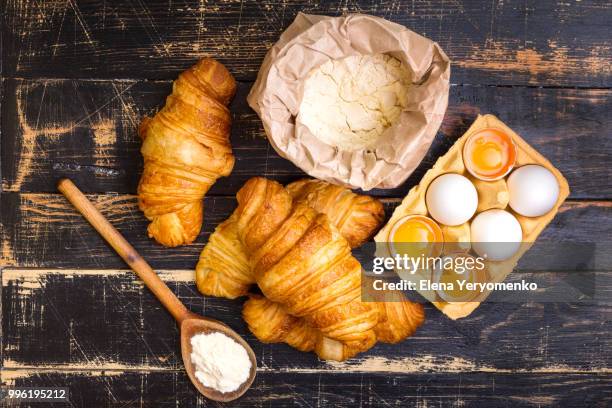 croissants, flour, eggs, spoon, rolling pin - rolling pin stock-fotos und bilder